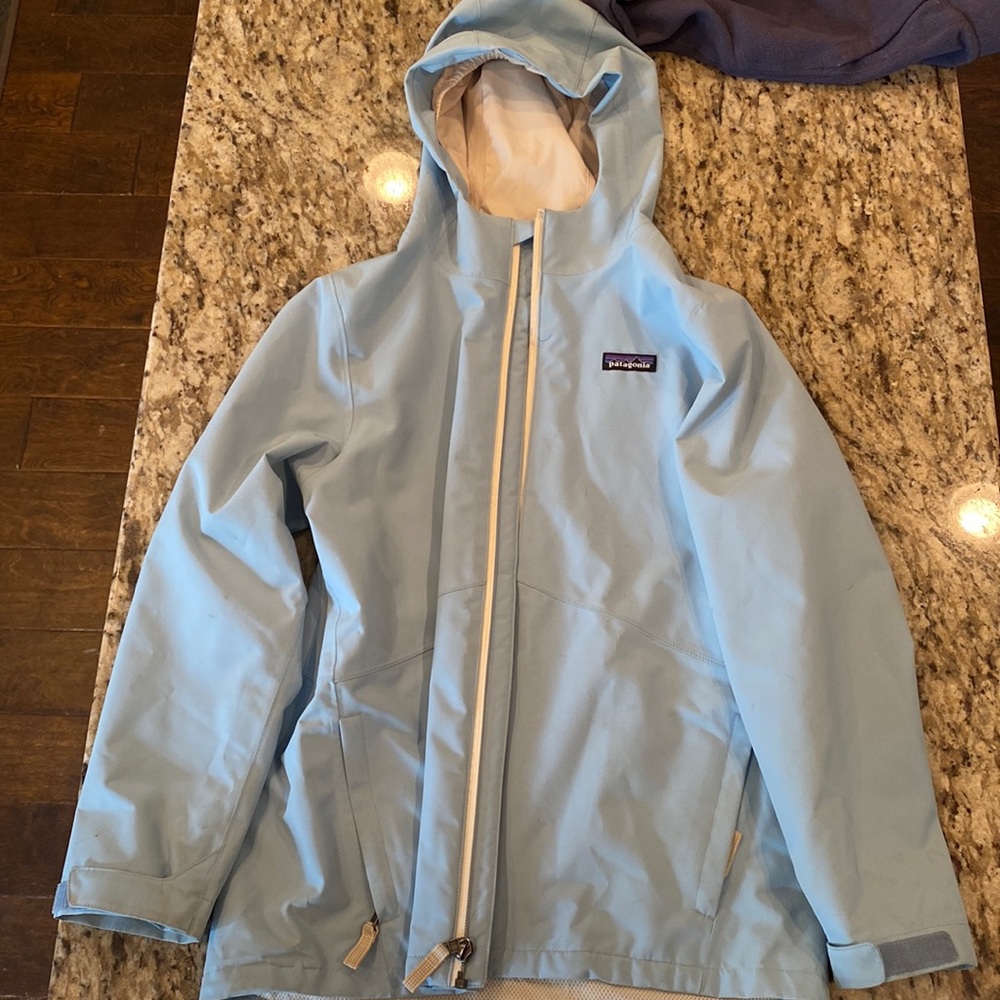 Blue jacket for warmth and protect from rain